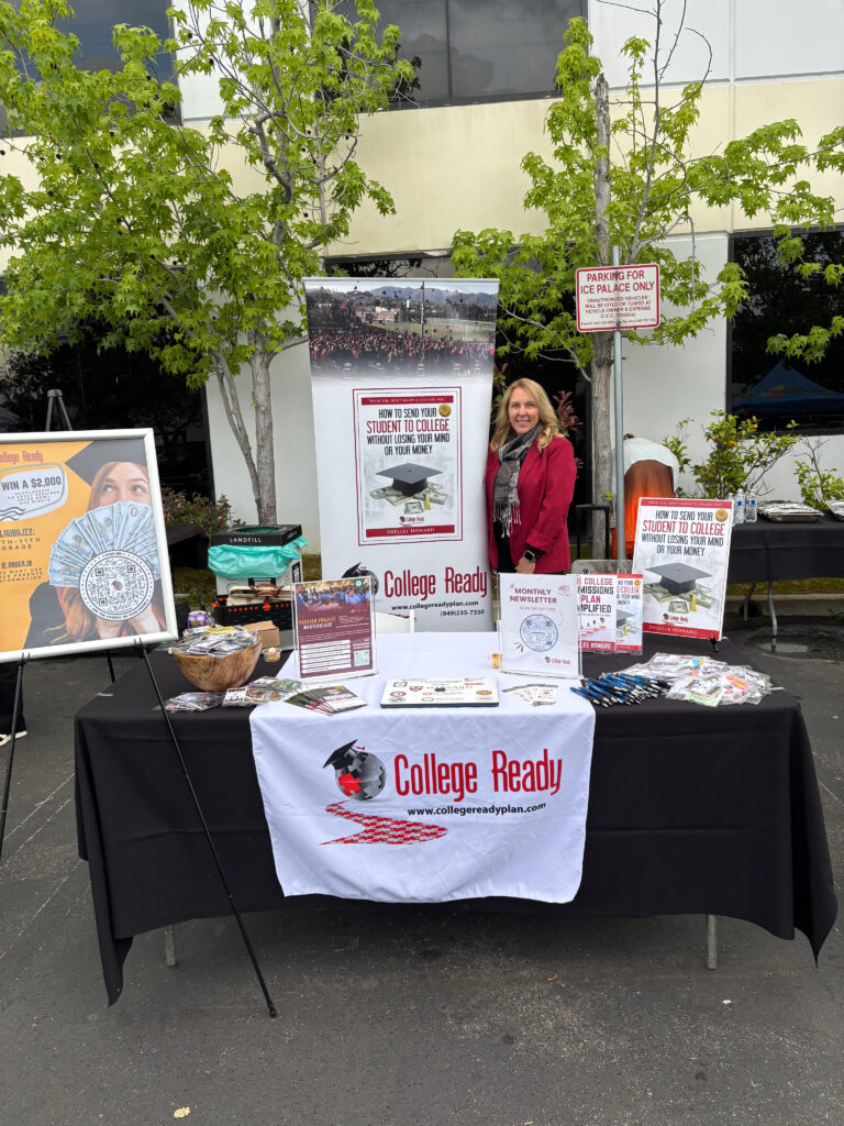 Shellee is posing at the College Ready pop-up booth in a parking lot.